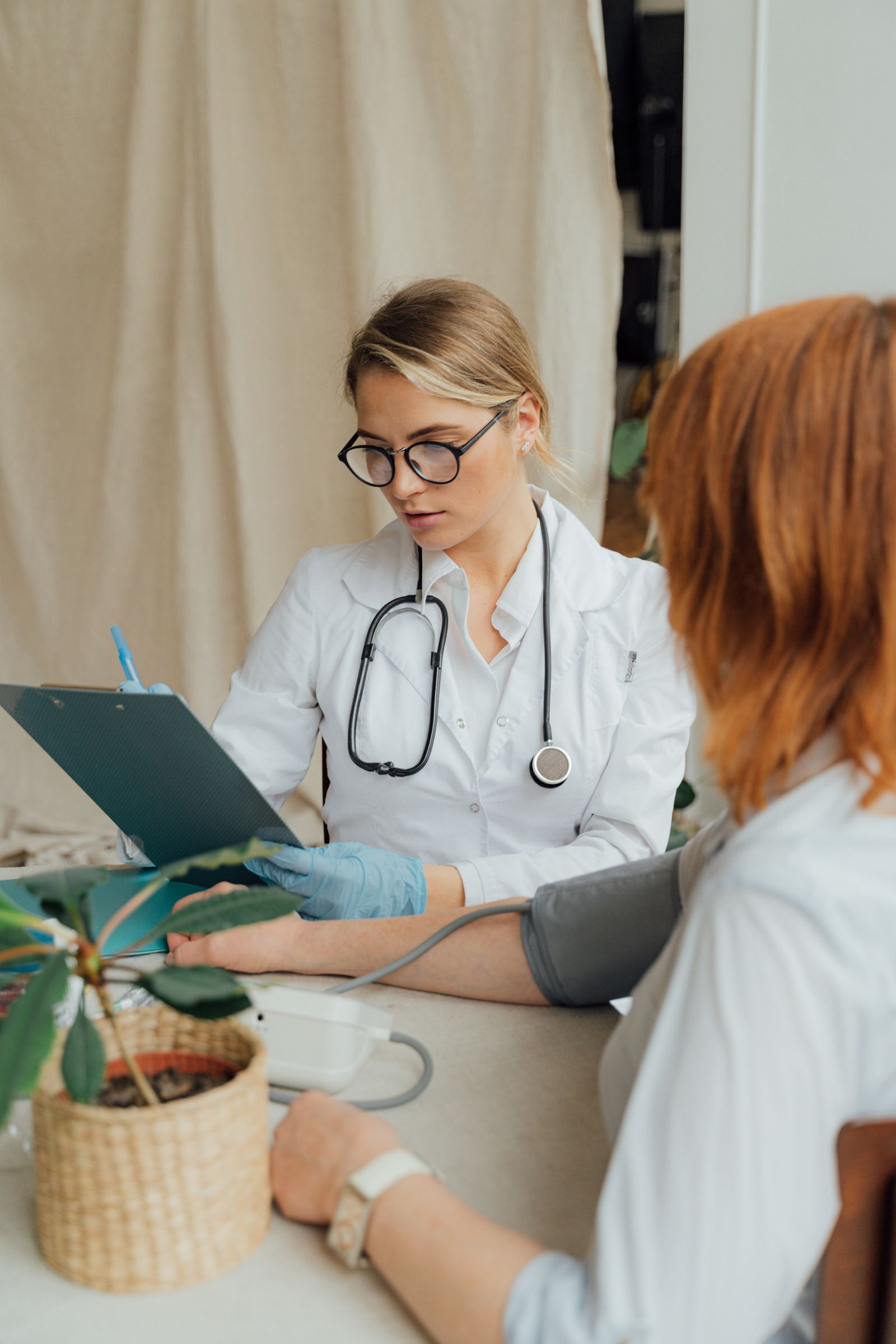 Doctor consulting with a patient; illustrative stock photograph